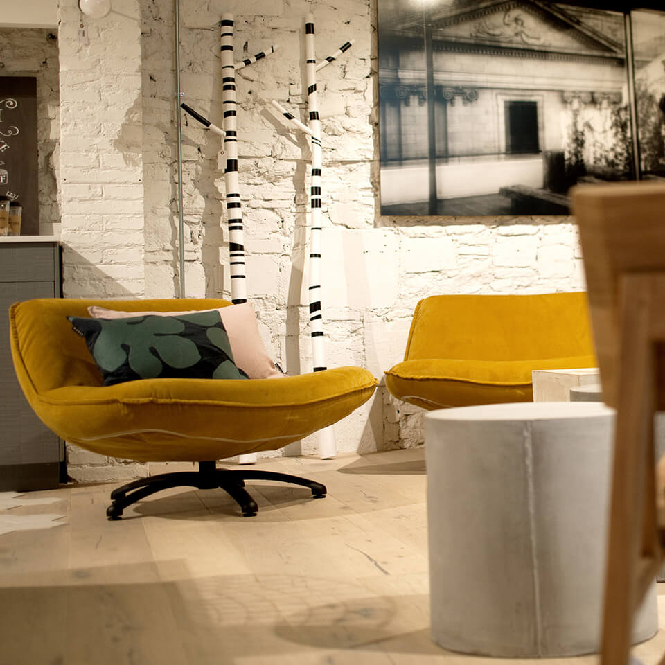 mustard armchair in Catalina House Barceloa store